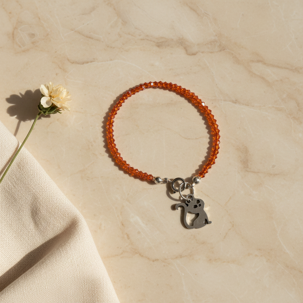 Pulsera de cristal con tupies de 3mm en naranja y colgante Salem de acero inoxidable