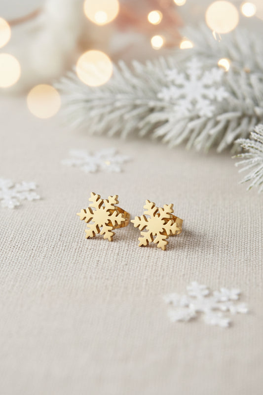 Pendientes CopO de Nieve de acero inoxidable dorado 