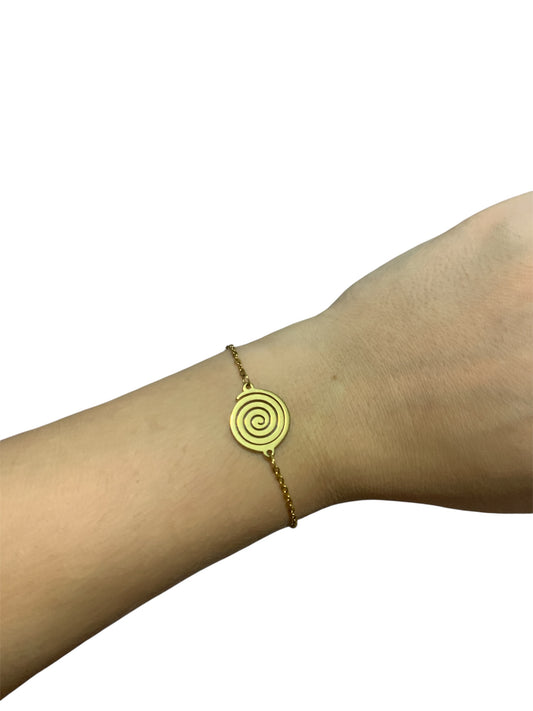 Pulsera espiral oro puesta 